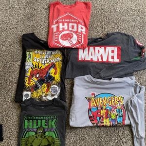 5 shirts large spider medium. 2 long and 3 short